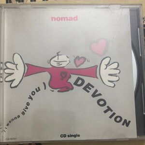 MC Mikee Freedom. 
Nomad Devotion CD Single - I Wanna Give You) Devotion